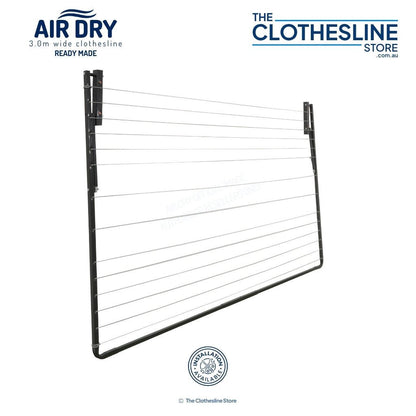Air Dry Clothesline folded flat against a white wall.