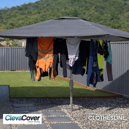 ClevaCover installed on a Fixed Head Galvanised Rotary Clothesline with workwear that has been washed hanging from the clothesline cord.